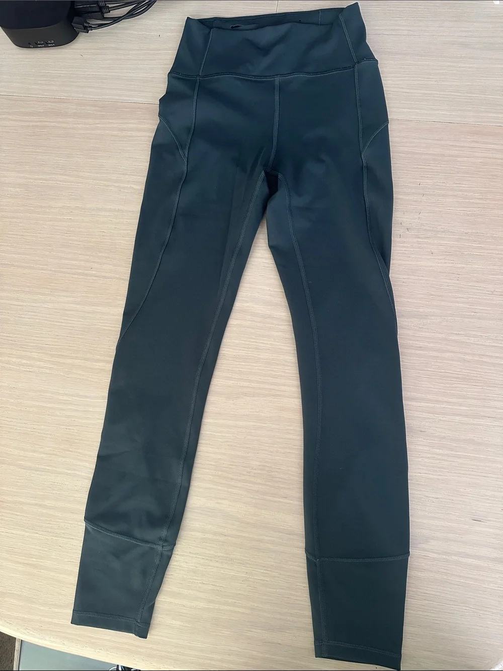 lululemon In Movement Tight 7/8 Dark Green sz 4